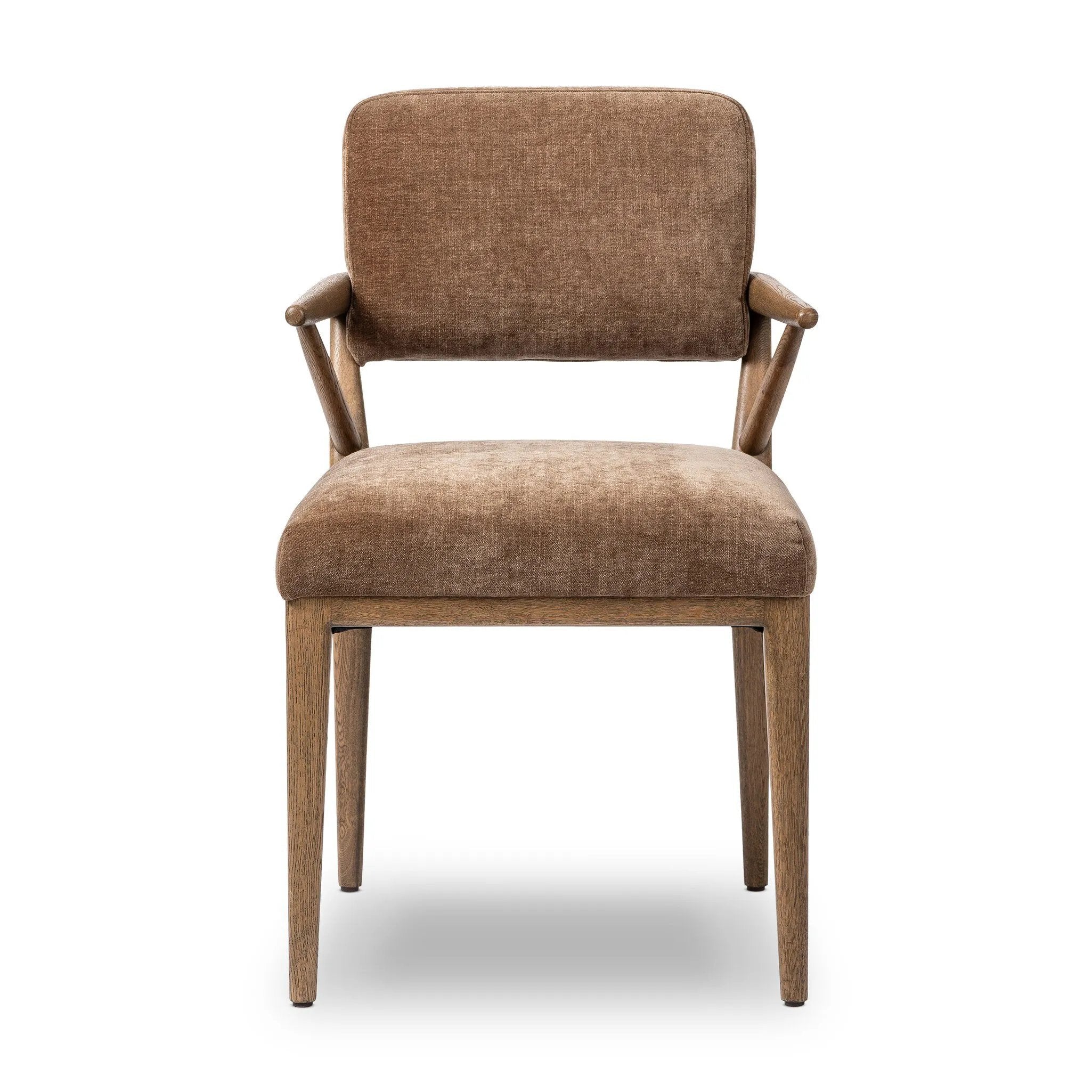Pastoral inspiration defines a thoughtfully designed dining chair of toasted oak, while soft earthen upholstery covers a comfortable seat and back Amethyst Home provides interior design, new home construction design consulting, vintage area rugs, and lighting in the Calabasas metro area.
