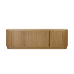 Crafted from desert oak solids and veneers with a plinth-style base, rounded sides and linear reeding, this sideboard exudes midcentury vibes.  Fully finished interior and shelves for quality detailing inside and out Amethyst Home provides interior design, new home construction design consulting, vintage area rugs, and lighting in the Dallas metro area.