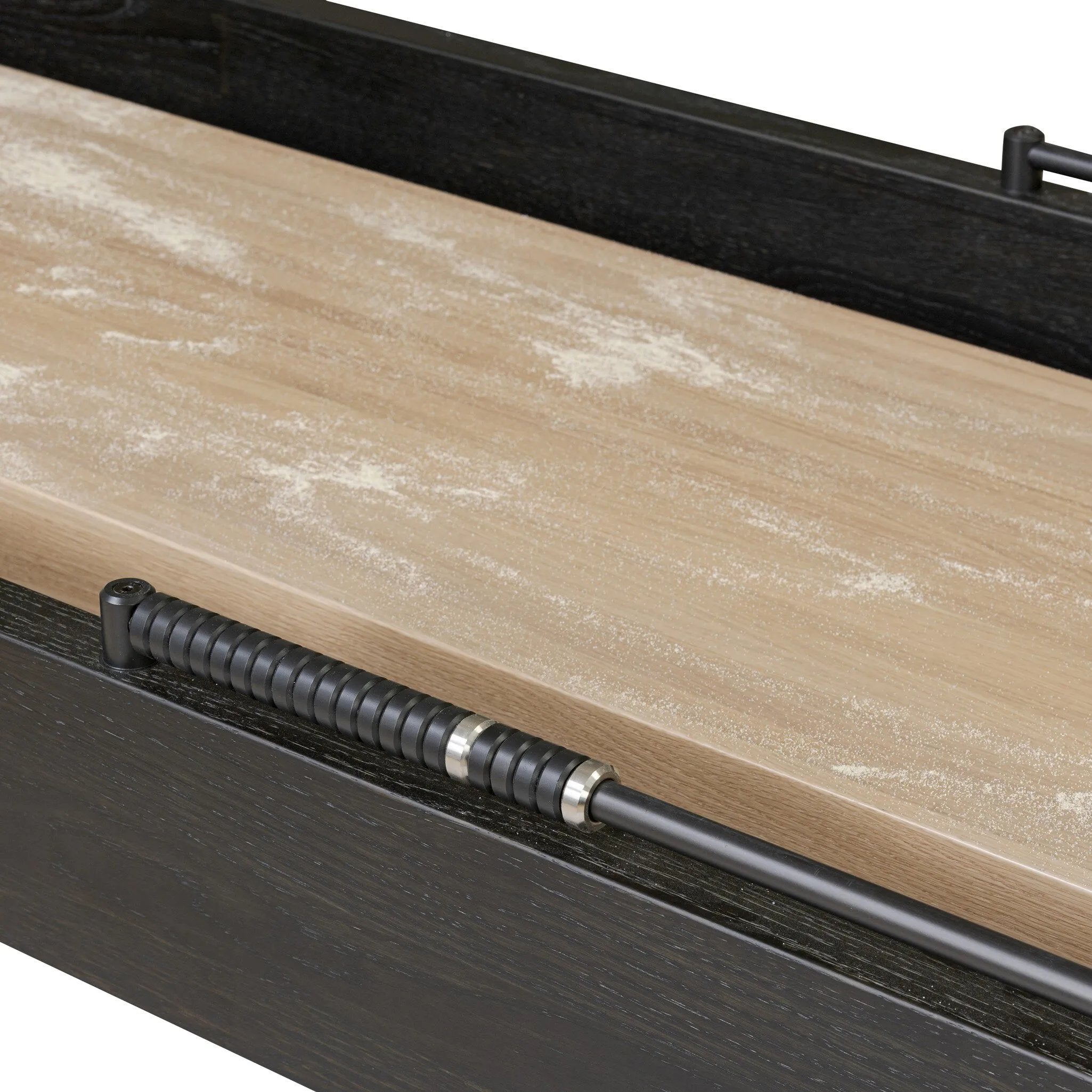 Material-driven for fun, this shuffleboard table features a hand-stitched leather landing surface, laminated solid oak game board — finished in a durable lacquer — and industrial trestle-style, cast iron legs. Climatic adjusters for leveling with ease. Each table comes with carved wood and steel pucks, as well as a steel ring scoring mechanism. Amethyst Home provides interior design, new home construction design consulting, vintage area rugs, and lighting in the Park City metro area.