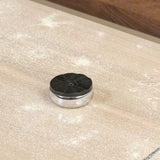 Material-driven for fun, this shuffleboard table features a hand-stitched leather landing surface, laminated solid oak game board — finished in a durable lacquer — and industrial trestle-style, cast iron legs. Climatic adjusters for leveling with ease. Each table comes with carved wood and steel pucks, as well as a steel ring scoring mechanism. Amethyst Home provides interior design, new home construction design consulting, vintage area rugs, and lighting in the Miami metro area.