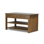 A kitchen island and waterfall dining table in one. Crafted from oak, the island system features two large shelves and three drawers on each side, all  topped with by warm grey marble. The pullout table extends and fits inside the frame with ease Amethyst Home provides interior design, new home construction design consulting, vintage area rugs, and lighting in the Laguna Beach metro area.