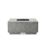 This outdoor fire table is a welcoming centerpiece designed for gathering. Made from glass-reinforced concrete, each piece is naturally finished with deep tones of pewter and dark grey. The monolithic shape is completed with lavastones in the center, bringing together a bold, monochromatic look. Amethyst Home provides interior design, new home construction design consulting, vintage area rugs, and lighting in the Alpharetta metro area.