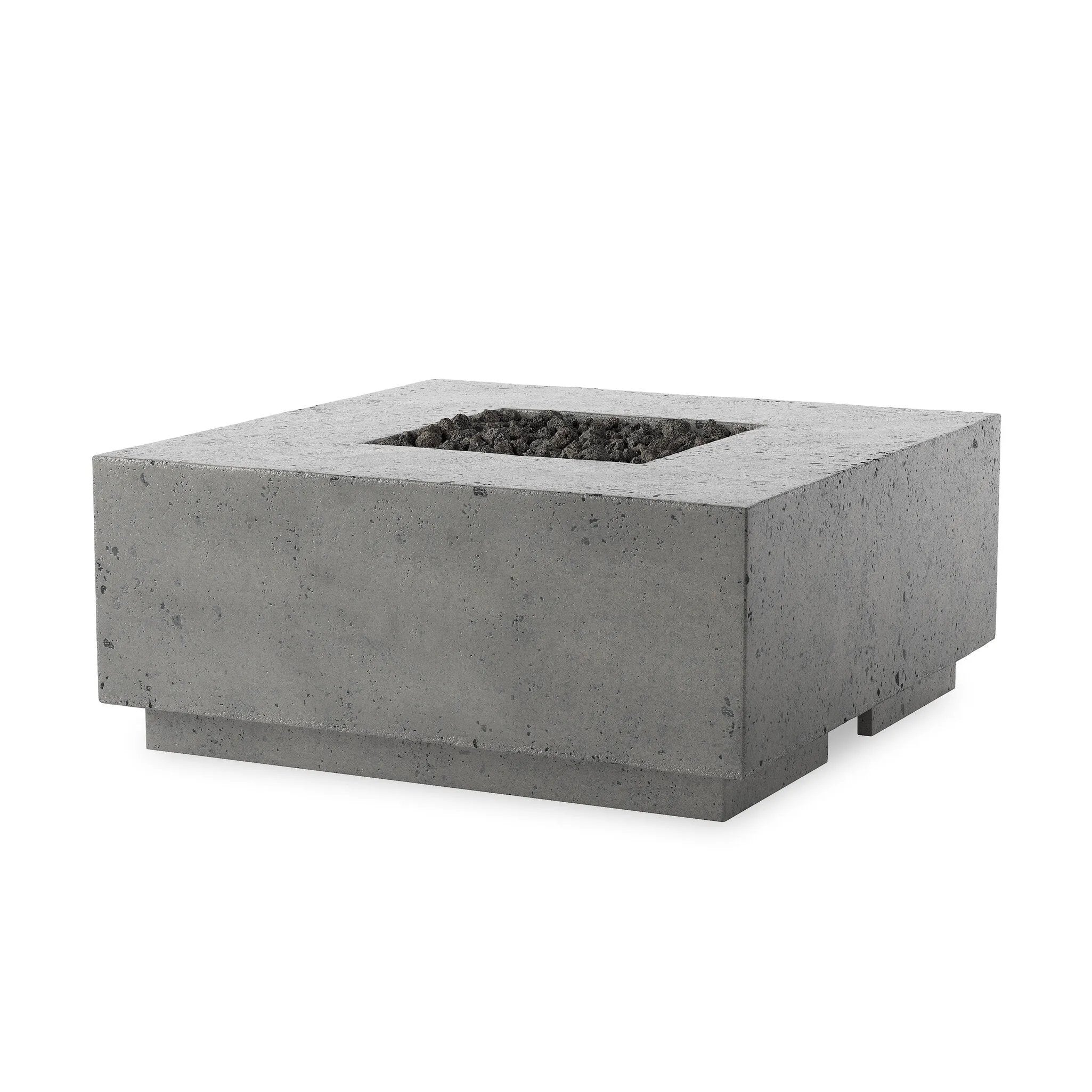 This outdoor fire table is a welcoming centerpiece designed for gathering. Made from glass-reinforced concrete, each piece is naturally finished with deep tones of pewter and dark grey. The monolithic shape is completed with lavastones in the center, bringing together a bold, monochromatic look. Amethyst Home provides interior design, new home construction design consulting, vintage area rugs, and lighting in the Newport Beach metro area.