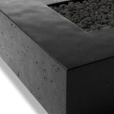 This outdoor fire table is a welcoming centerpiece designed for gathering. Made from glass-reinforced concrete, each piece is naturally finished with deep tones of charcoal. The monolithic shape is completed with lavastones in the center, bringing together a bold, monochromatic look. Amethyst Home provides interior design, new home construction design consulting, vintage area rugs, and lighting in the Salt Lake City metro area.