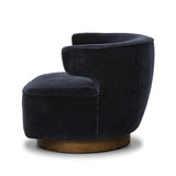 Featuring Dottie Monte Navy Swivel Chair by Four Hands at Amethyst Home. The continuous form of this swivel chair creates a sleek look that elevates everyday seating. Upholstered in navy wool blend, its sleek design is complemented by a 360-degree swivel and pedestal base of solid parawood for a mixed media moment. Overall Dimensions: 29.00"w x 33.75"d x 27.25. Amethyst Home provides interior design, new home construction design consulting, vintage area rugs, and lighting in the Austin metro area.