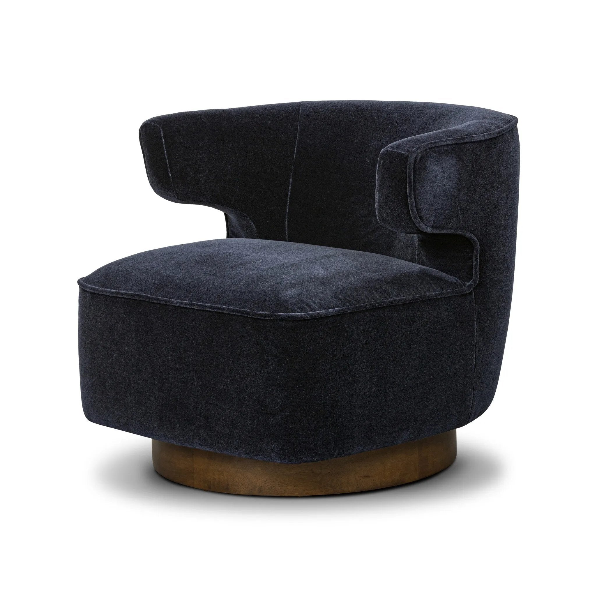 The continuous form of this swivel chair creates a sleek look that elevates everyday seating. Upholstered in navy wool blend, its sleek design is complemented by a 360-degree swivel and pedestal base of solid parawood for a mixed media moment Amethyst Home provides interior design, new home construction design consulting, vintage area rugs, and lighting in the Calabasas metro area.