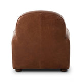 The popular Art Deco club chair makes a comeback. With a prominent curved top, deep seat with a loose cushion, and armrests designed for true relaxation, the armchair invites you to sit back and take it all in. Upholstered in rich mahogany top-grain leather. Amethyst Home provides interior design, new home construction design consulting, vintage area rugs, and lighting in the Portland metro area.