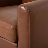 The popular Art Deco club chair makes a comeback. With a prominent curved top, deep seat with a loose cushion, and armrests designed for true relaxation, the armchair invites you to sit back and take it all in. Upholstered in rich mahogany top-grain leather. Amethyst Home provides interior design, new home construction design consulting, vintage area rugs, and lighting in the Seattle metro area.