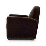 The popular Art Deco club chair makes a comeback. With a prominent curved top, deep seat with a loose cushion, and armrests designed for true relaxation, the armchair invites you to sit back and take it all in. Upholstered in rich chocolate upholstery.As fans of luxe materials at Amethyst, we love the nature inspired Draper Chair - Monte Chocolate. Amethyst Home provides interior design, new home construction design consulting, vintage area rugs, and lighting in the Boston metro area.