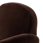 The popular Art Deco club chair makes a comeback. With a prominent curved top, deep seat with a loose cushion, and armrests designed for true relaxation, the armchair invites you to sit back and take it all in. Upholstered in rich chocolate upholstery.As fans of luxe materials at Amethyst, we love the nature inspired Draper Chair - Monte Chocolate. Amethyst Home provides interior design, new home construction design consulting, vintage area rugs, and lighting in the Monterey metro area.