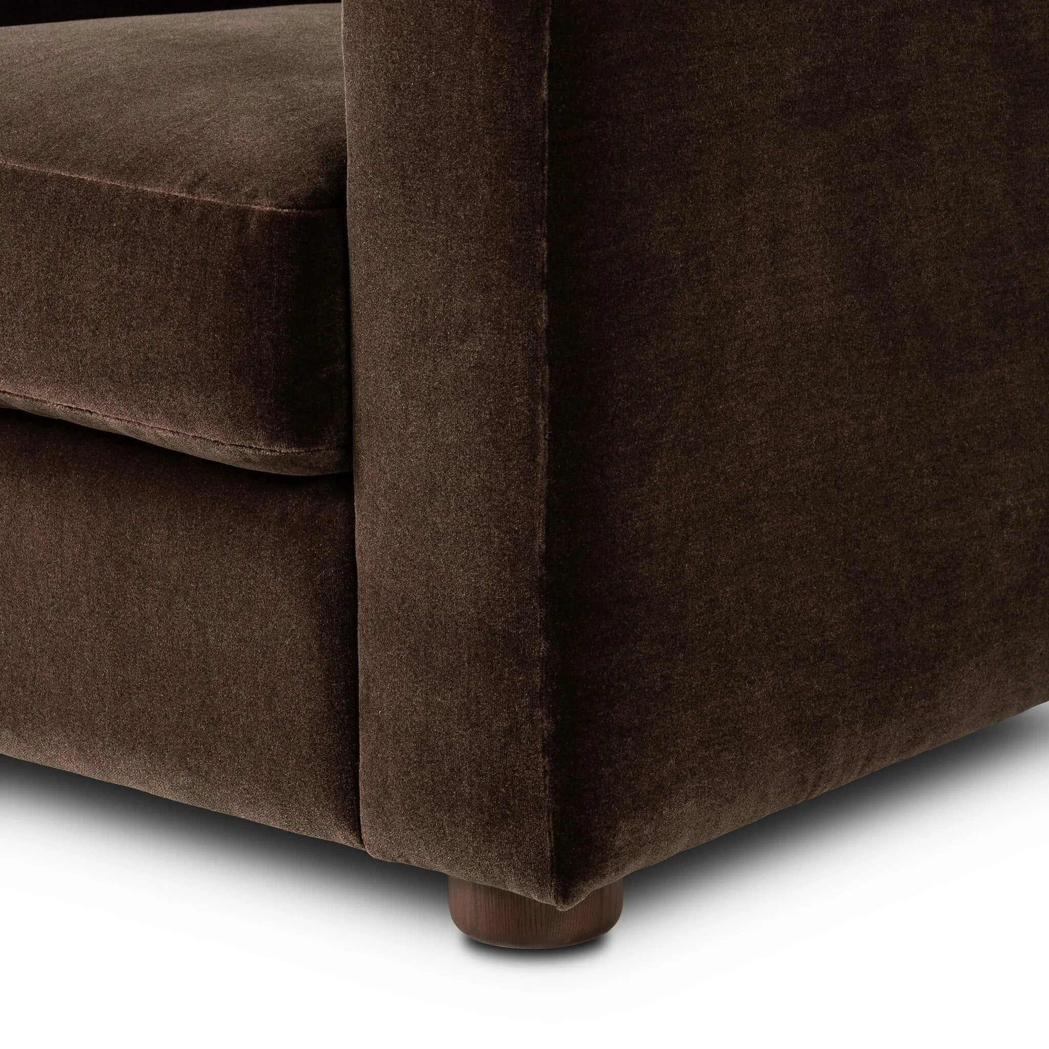 The popular Art Deco club chair makes a comeback. With a prominent curved top, deep seat with a loose cushion, and armrests designed for true relaxation, the armchair invites you to sit back and take it all in. Upholstered in rich chocolate upholstery.As fans of luxe materials at Amethyst, we love the nature inspired Draper Chair - Monte Chocolate. Amethyst Home provides interior design, new home construction design consulting, vintage area rugs, and lighting in the Newport Beach metro area.