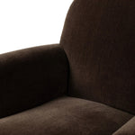 The popular Art Deco club chair makes a comeback. With a prominent curved top, deep seat with a loose cushion, and armrests designed for true relaxation, the armchair invites you to sit back and take it all in. Upholstered in rich chocolate upholstery.As fans of luxe materials at Amethyst, we love the nature inspired Draper Chair - Monte Chocolate. Amethyst Home provides interior design, new home construction design consulting, vintage area rugs, and lighting in the Omaha metro area.