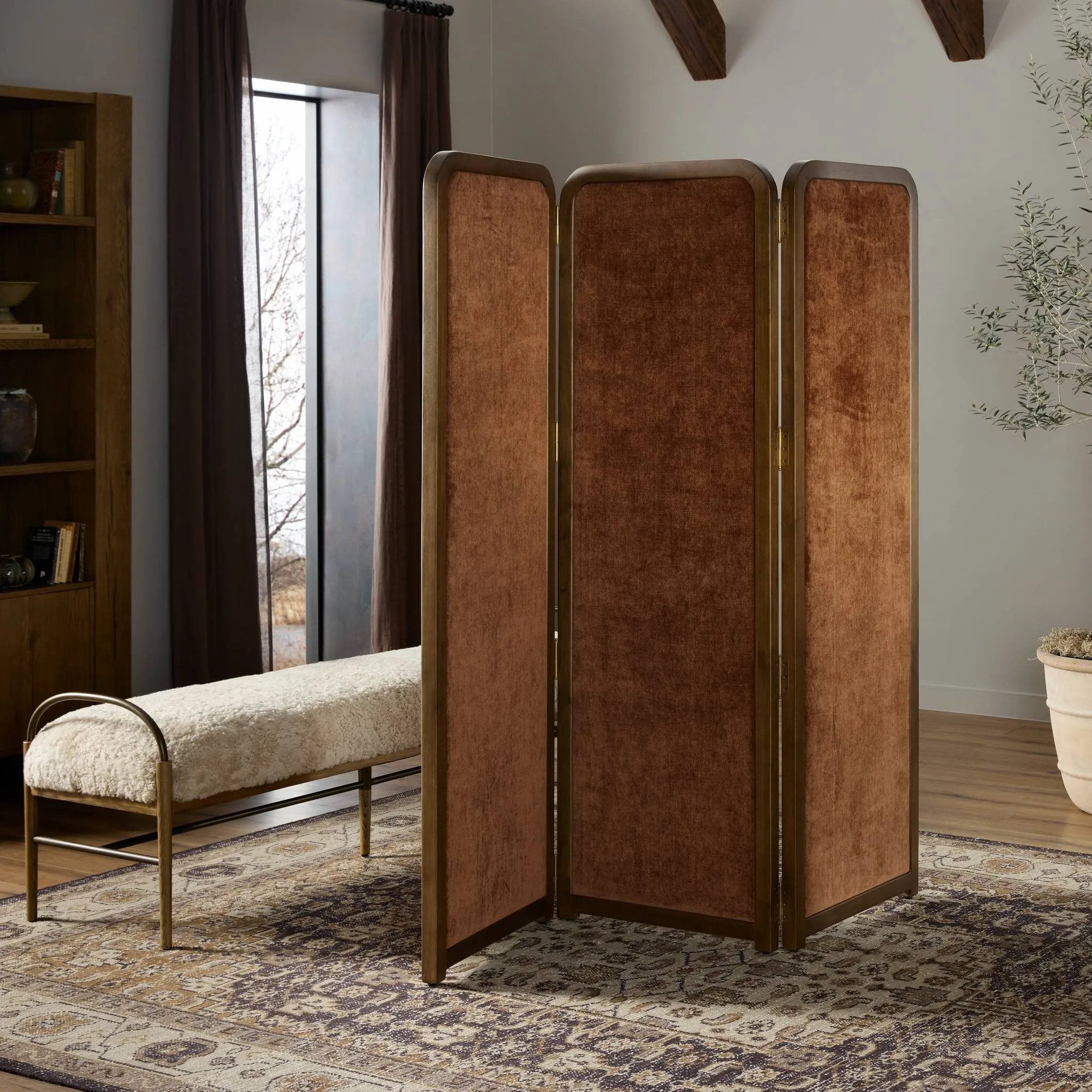 Add privacy where you need it with a vintage-inspired room divider. Three long panels are upholstered in a rich rust-colored chenille and framed out by warm parawood Amethyst Home provides interior design, new home construction design consulting, vintage area rugs, and lighting in the Seattle metro area.