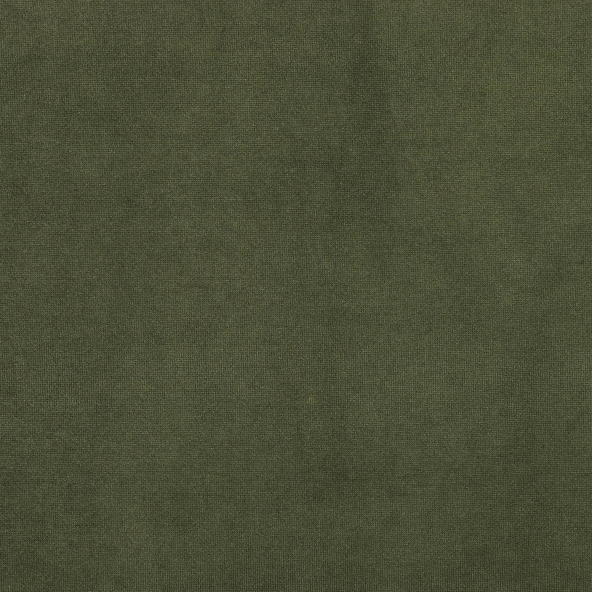 A low, spacious mid-century silhouette is covered in velvety upholstery in an intriguing sapphire olive, with blind tufting Amethyst Home provides interior design, new home construction design consulting, vintage area rugs, and lighting in the Kansas City metro area.
