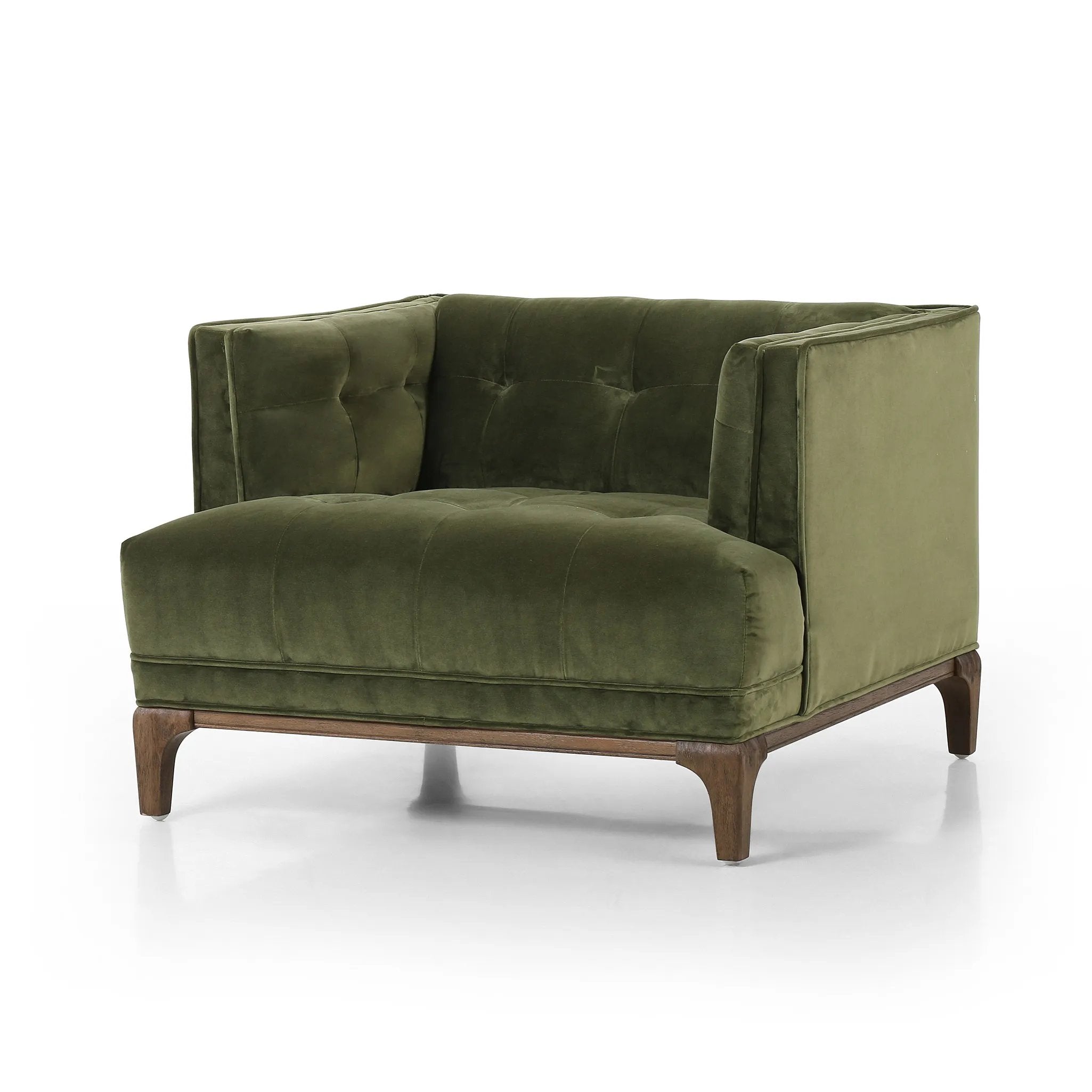 A low, spacious mid-century silhouette is covered in velvety upholstery in an intriguing sapphire olive, with blind tufting Amethyst Home provides interior design, new home construction design consulting, vintage area rugs, and lighting in the Monterey metro area.