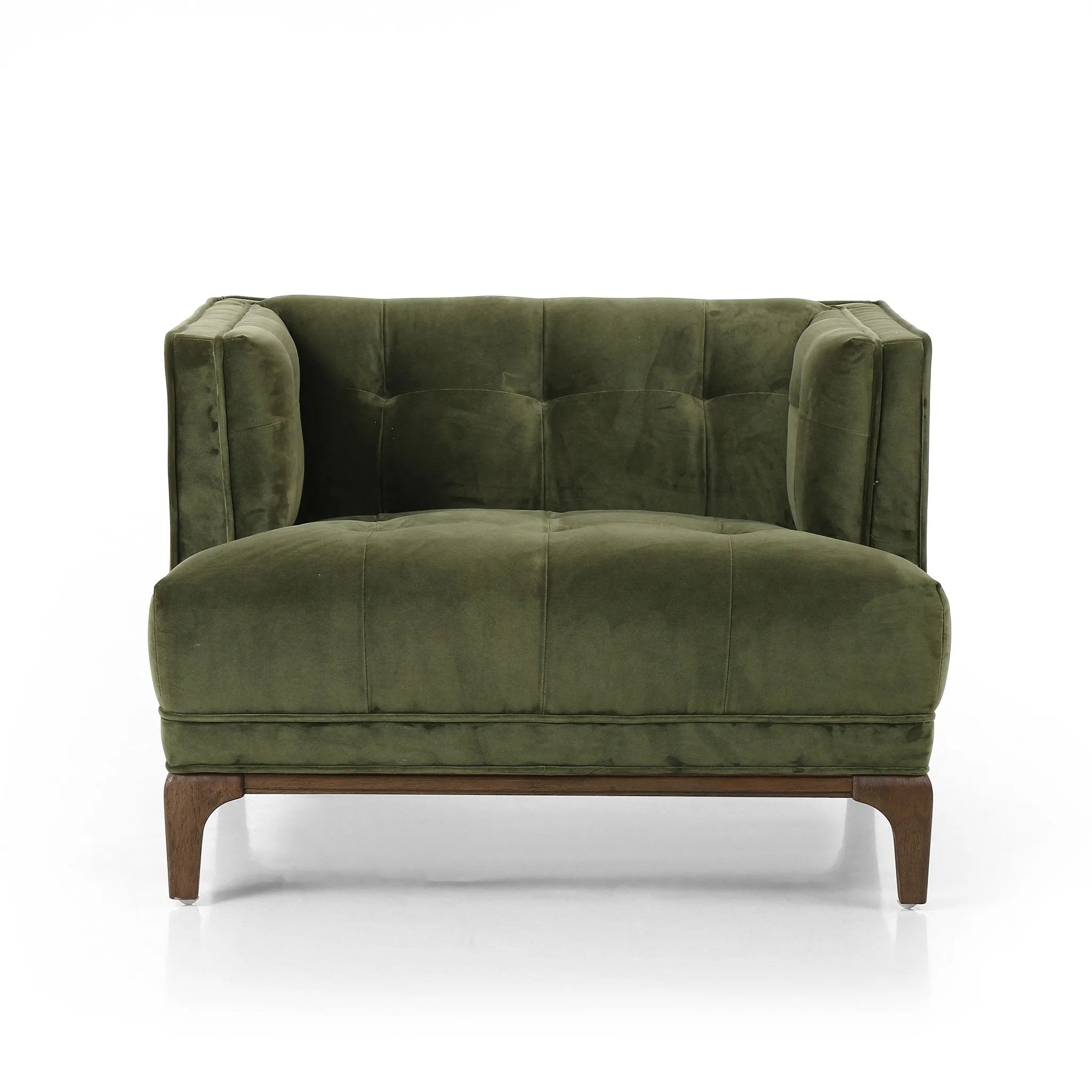 A low, spacious mid-century silhouette is covered in velvety upholstery in an intriguing sapphire olive, with blind tufting Amethyst Home provides interior design, new home construction design consulting, vintage area rugs, and lighting in the Tampa metro area.