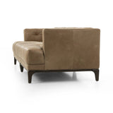 A modernized midcentury silhouette meets the traditional Chesterfield sofa, all in a compact profile perfect for smaller spaces. Top-grain leather in a tan hue, button tufting and a smooth touch bring deep comfort to lounging Amethyst Home provides interior design, new home construction design consulting, vintage area rugs, and lighting in the Calabasas metro area.