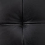 A modernized midcentury silhouette meets the traditional Chesterfield sofa, all in a compact profile perfect for smaller spaces. Top-grain leather in a classic black, button tufting and a smooth touch bring deep comfort to lounging Amethyst Home provides interior design, new home construction design consulting, vintage area rugs, and lighting in the Salt Lake City metro area.