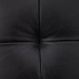 A modernized midcentury silhouette meets the traditional Chesterfield sofa, all in a compact profile perfect for smaller spaces. Top-grain leather in a classic black, button tufting and a smooth touch bring deep comfort to lounging Amethyst Home provides interior design, new home construction design consulting, vintage area rugs, and lighting in the Salt Lake City metro area.