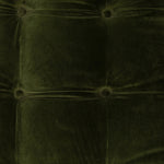 A modernized midcentury silhouette meets the traditional Chesterfield sofa, all in a compact profile perfect for smaller spaces. Smooth velvet in an olive hue, button tufting and a soft touch bring deep comfort to lounging Amethyst Home provides interior design, new home construction design consulting, vintage area rugs, and lighting in the Austin metro area.