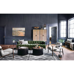A modernized midcentury silhouette meets the traditional Chesterfield sofa, all in a compact profile perfect for smaller spaces. Smooth velvet in an olive hue, button tufting and a soft touch bring deep comfort to lounging Amethyst Home provides interior design, new home construction design consulting, vintage area rugs, and lighting in the Charlotte metro area.