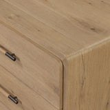 Simple and spacious, this oak dresser has six drawers paired with aged bronze and wood hardware. Waterfall shaping and soft-close undermount glides give a smooth finish Amethyst Home provides interior design, new home construction design consulting, vintage area rugs, and lighting in the Newport Beach metro area.