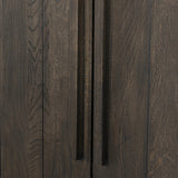 Featuring Elgin Brushed Dark Brown Cabinet by Four Hands at Amethyst Home. A clean, structured piece with plenty of presence. Made from oak and finished in a rich, dark brown, storage-driven cabinetry features plank-style doors, with linear hardware elongating the whole look.Overall Dimensions: 43.00"w x 20.00"d x 78.00"hWeight : 293.21 lbsMaterials: Oak Veneer. Amethyst Home provides interior design, new home construction design consulting, vintage area rugs, and lighting in the Omaha metro area.
