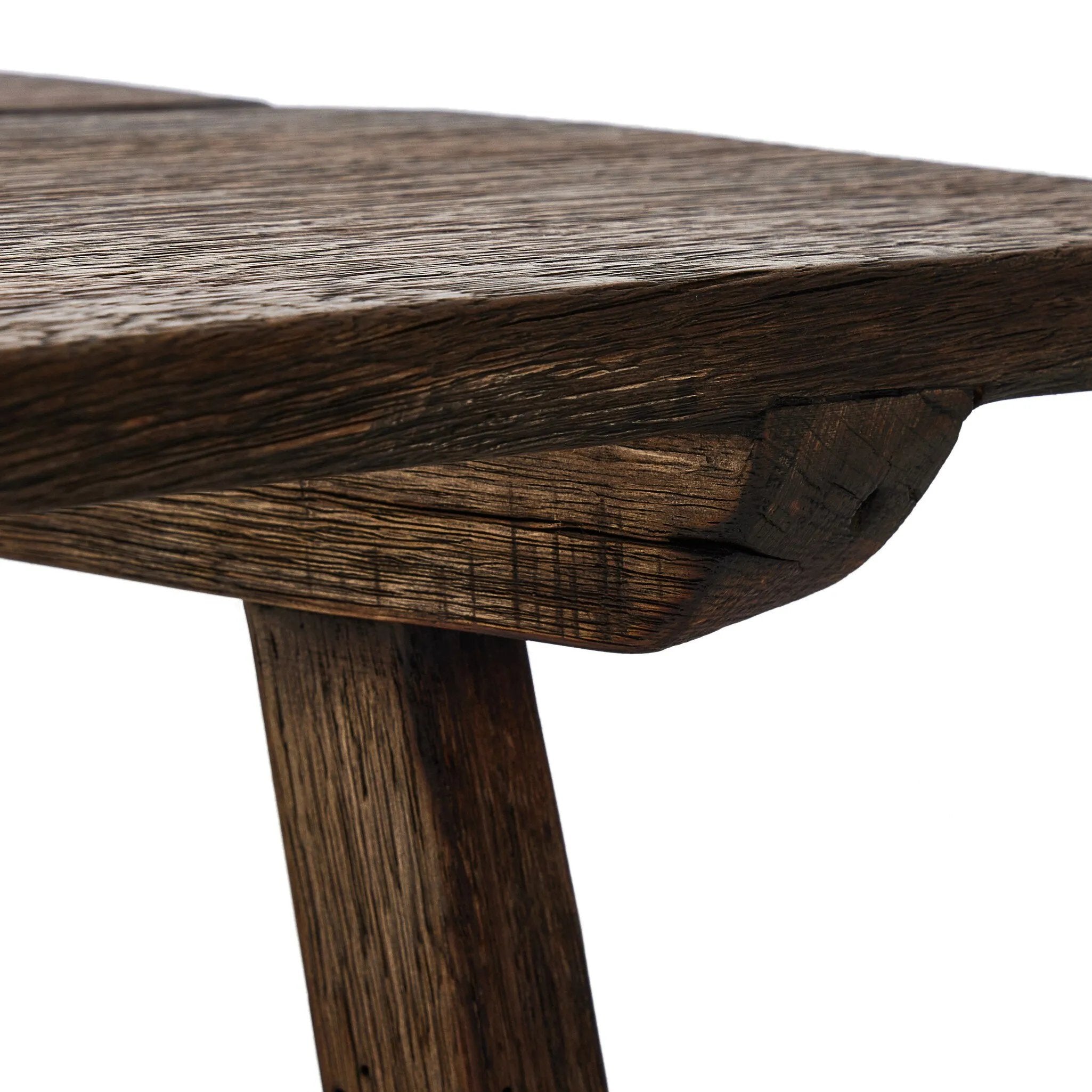 Accent your living space with a Wabi Sabi-inspired end table. Crafted from burnt bleached oak with a trellis base and wide plank top, this artisanal piece embraces the natural cracks and graining reflective of organic materials to bring a beautiful, character-rich look to your space Amethyst Home provides interior design, new home construction design consulting, vintage area rugs, and lighting in the Dallas metro area.