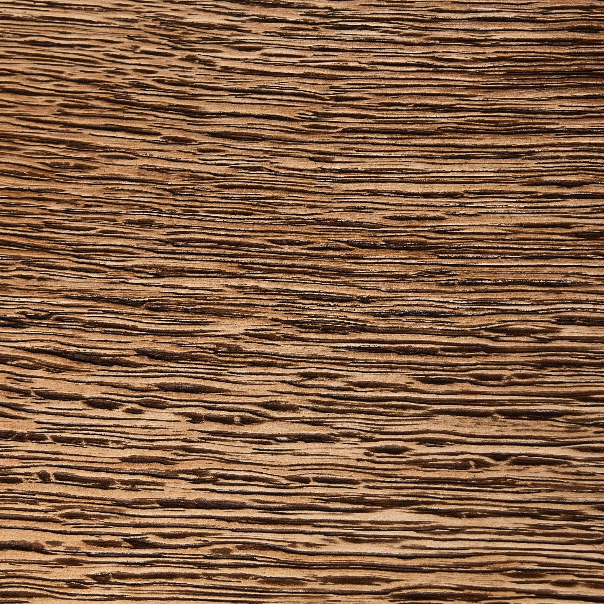 Accent your living space with a Wabi Sabi-inspired end table. Crafted from burnt bleached oak with a trellis base and wide plank top, this artisanal piece embraces the natural cracks and graining reflective of organic materials to bring a beautiful, character-rich look to your space Amethyst Home provides interior design, new home construction design consulting, vintage area rugs, and lighting in the Winter Garden metro area.