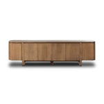 A clean-styled media console made from warm, grain-rich oak. Six doors feature subtle finger grooves for easy open. Gentle curves soften up the look, while a floating design keeps things feeling light and fresh. Inside, generous shelving awaits storage of media and more. Amethyst Home provides interior design, new home construction design consulting, vintage area rugs, and lighting in the Salt Lake City metro area.
