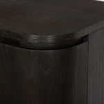 A clean-styled media console made from worn black oak. Six doors feature subtle finger grooves for easy open. Gentle curves soften up the look, while a floating design keeps things feeling light and fresh. Inside, generous shelving awaits storage of media and more. Amethyst Home provides interior design, new home construction design consulting, vintage area rugs, and lighting in the Alpharetta metro area.