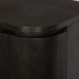 A clean-styled media console made from worn black oak. Six doors feature subtle finger grooves for easy open. Gentle curves soften up the look, while a floating design keeps things feeling light and fresh. Inside, generous shelving awaits storage of media and more. Amethyst Home provides interior design, new home construction design consulting, vintage area rugs, and lighting in the Alpharetta metro area.