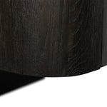 A clean-styled media console made from worn black oak. Six doors feature subtle finger grooves for easy open. Gentle curves soften up the look, while a floating design keeps things feeling light and fresh. Inside, generous shelving awaits storage of media and more. Amethyst Home provides interior design, new home construction design consulting, vintage area rugs, and lighting in the Tampa metro area.
