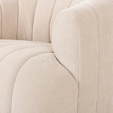 Featuring Elliana Blamont Cream Swivel Chair by Four Hands at Amethyst Home. Meet the chair that offers it all: curves, color, texture, durability, and sustainability. All atop a modern 360-degree swivel. Easy to clean and made from fully recyclable materials, FIQA fabrics are machine-washable, stain-resistant, water-repellent and antimicrobial.Overall Dime. Amethyst Home provides interior design, new home construction design consulting, vintage area rugs, and lighting in the Charlotte metro area.