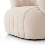 Featuring Elliana Blamont Cream Swivel Chair by Four Hands at Amethyst Home. Meet the chair that offers it all: curves, color, texture, durability, and sustainability. All atop a modern 360-degree swivel. Easy to clean and made from fully recyclable materials, FIQA fabrics are machine-washable, stain-resistant, water-repellent and antimicrobial.Overall Dim. Amethyst Home provides interior design, new home construction design consulting, vintage area rugs, and lighting in the Des Moines metro area.