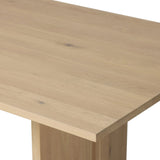 Thoughtful design details takes this long, linear dining table to the next level. Tapered shaping creates a clean, angular profile on the base, with splice leg detailing bringing a design-forward look to the whole piece. Fully crafted from bleached oak sourced from Romania. Amethyst Home provides interior design, new home construction design consulting, vintage area rugs, and lighting in the Calabasas metro area.