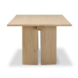 Thoughtful design details takes this long, linear dining table to the next level. Tapered shaping creates a clean, angular profile on the base, with splice leg detailing bringing a design-forward look to the whole piece. Fully crafted from bleached oak sourced from Romania. Amethyst Home provides interior design, new home construction design consulting, vintage area rugs, and lighting in the Los Angeles metro area.