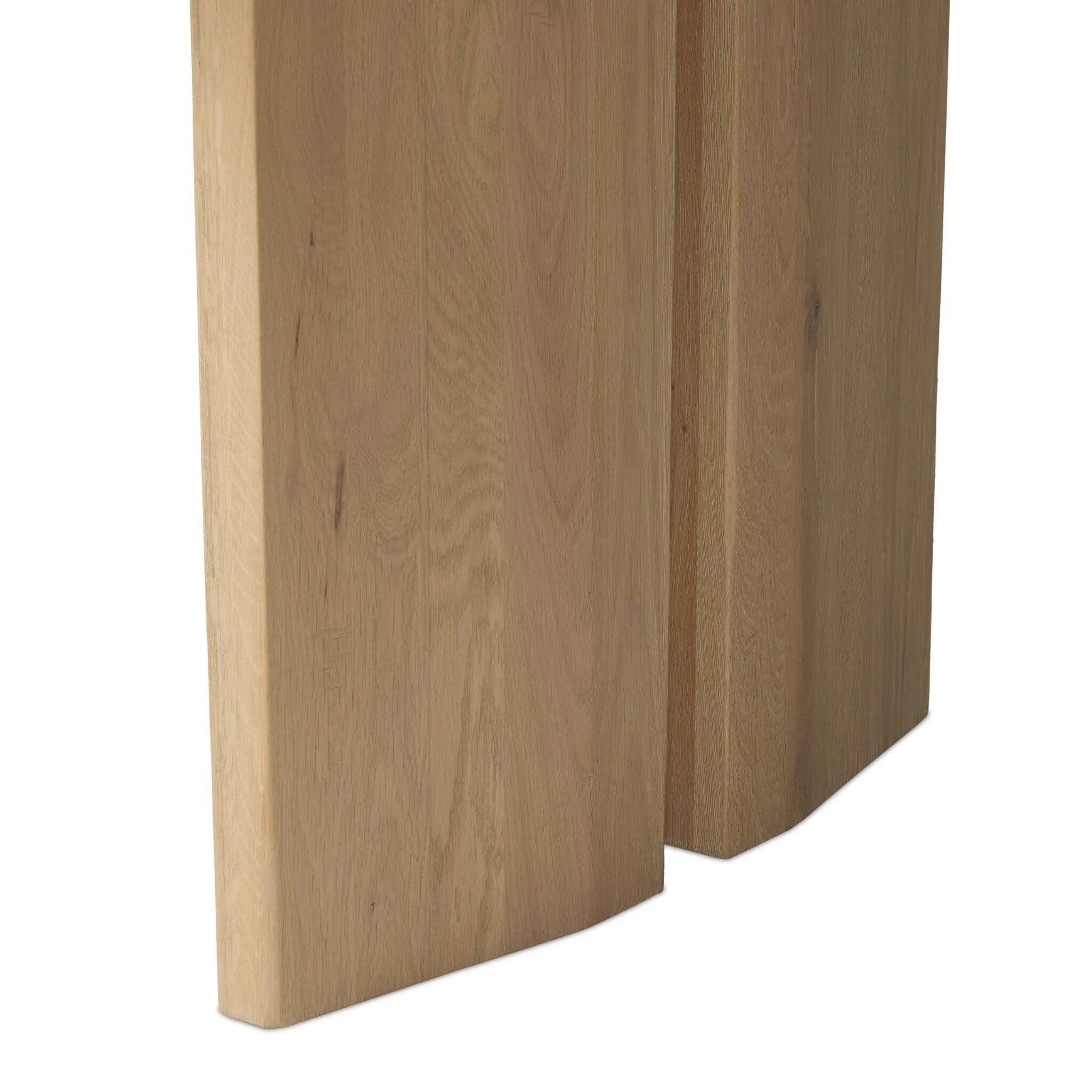 Thoughtful design details takes this long, linear dining table to the next level. Tapered shaping creates a clean, angular profile on the base, with splice leg detailing bringing a design-forward look to the whole piece. Fully crafted from bleached oak sourced from Romania. Amethyst Home provides interior design, new home construction design consulting, vintage area rugs, and lighting in the Seattle metro area.