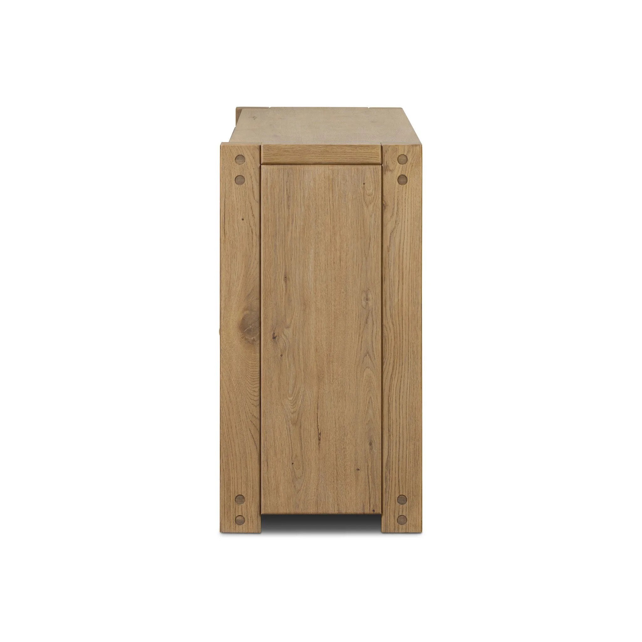 Built from thick-cut oak and veneers with an aged smoked finish, this farmhouse-inspired eight-drawer dresser features softened edges, fastening details, integrated wood hardware and soft-close drawer glides for quality construction Amethyst Home provides interior design, new home construction design consulting, vintage area rugs, and lighting in the Scottsdale metro area.