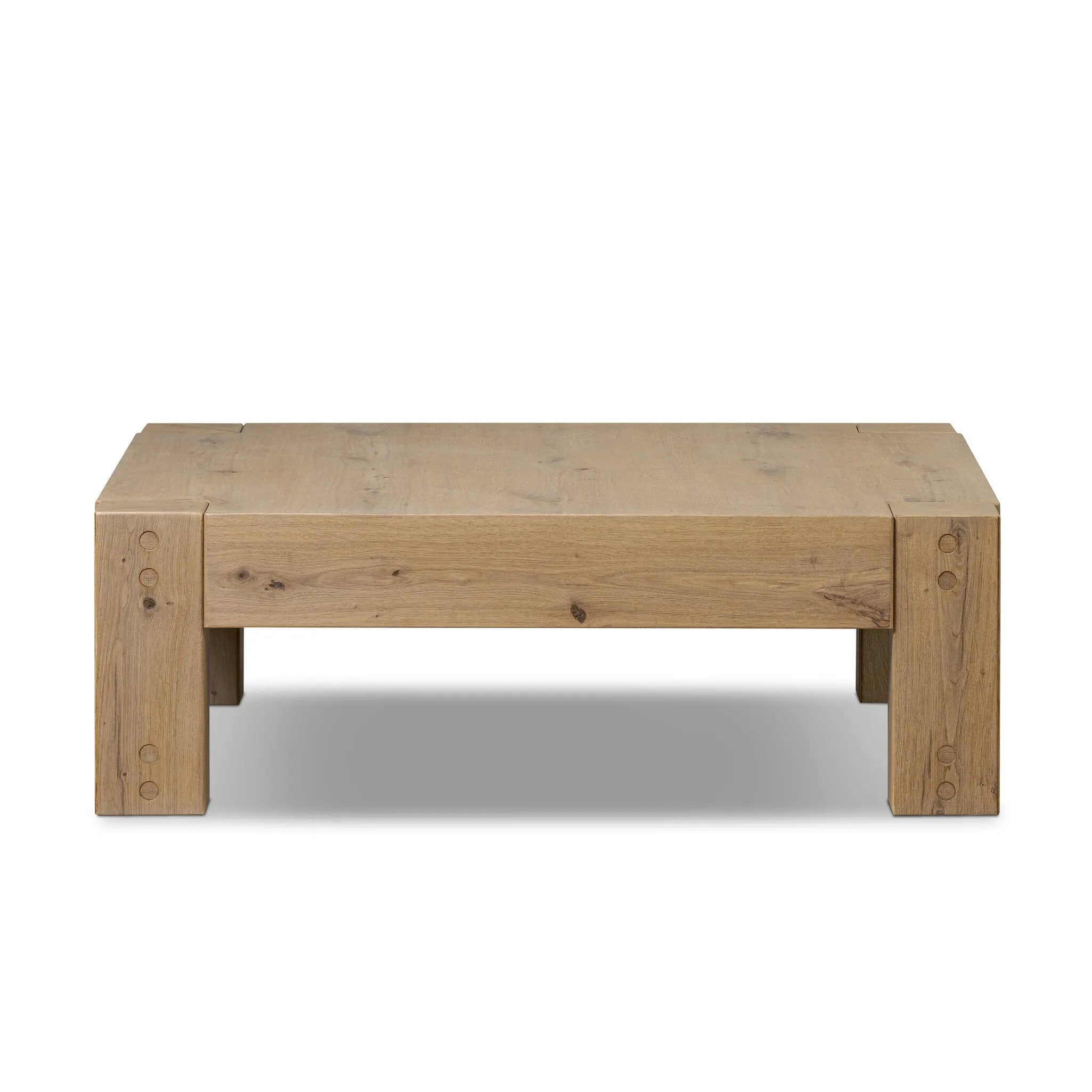 Built from thick-cut oak and veneers with an aged smoked finish, this farmhouse-inspired coffee table features chunky squared legs Amethyst Home provides interior design, new home construction design consulting, vintage area rugs, and lighting in the Houston metro area.