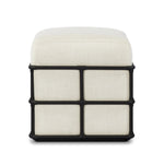 Inspired by traditional rattan forms, this outdoor stool is reimagined in a contemporary material palette that leans into the French garden aesthetic. With a grid-like take on the barrel silhouette, an ironwork frame features cross-hatch details. Cover or store inside during inclement weather and when not in use. Amethyst Home provides interior design, new home construction design consulting, vintage area rugs, and lighting in the Alpharetta metro area.