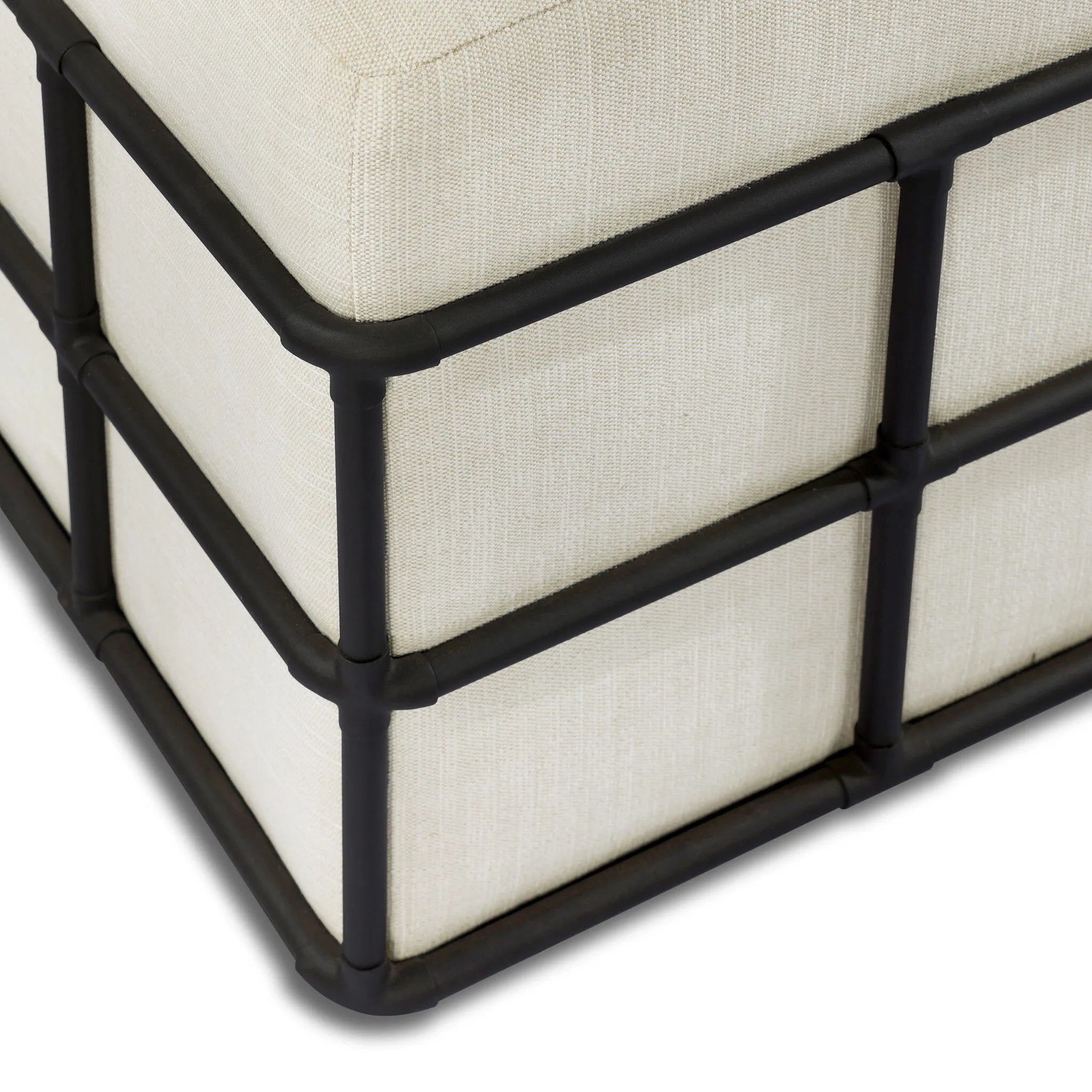 Inspired by traditional rattan forms, this outdoor stool is reimagined in a contemporary material palette that leans into the French garden aesthetic. With a grid-like take on the barrel silhouette, an ironwork frame features cross-hatch details. Cover or store inside during inclement weather and when not in use. Amethyst Home provides interior design, new home construction design consulting, vintage area rugs, and lighting in the Dallas metro area.