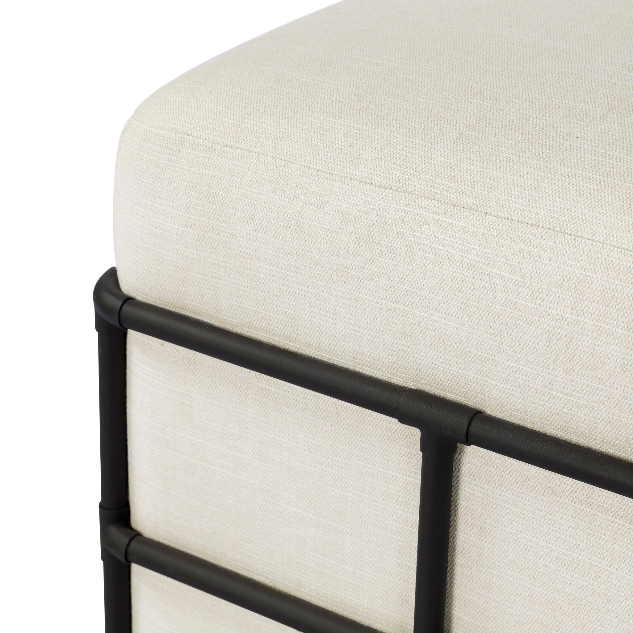Inspired by traditional rattan forms, this outdoor stool is reimagined in a contemporary material palette that leans into the French garden aesthetic. With a grid-like take on the barrel silhouette, an ironwork frame features cross-hatch details. Cover or store inside during inclement weather and when not in use. Amethyst Home provides interior design, new home construction design consulting, vintage area rugs, and lighting in the Laguna Beach metro area.