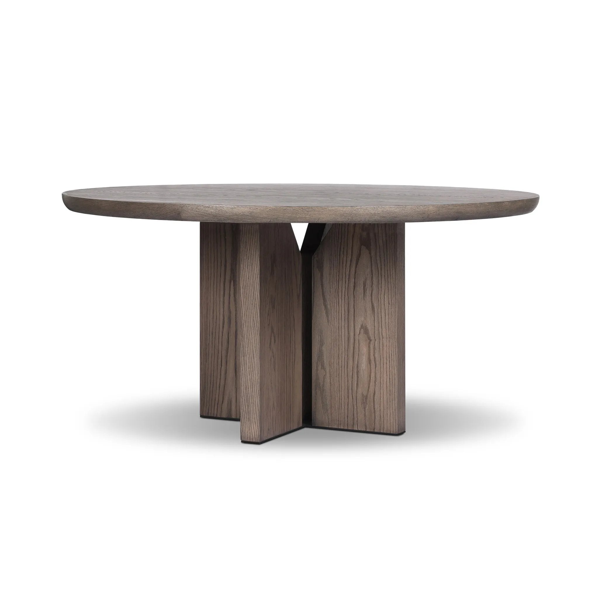 Inspired by minimalist Nordic design, a grey-finished oak dining table has a base of four plinth legs for a simple but impactful detail Amethyst Home provides interior design, new home construction design consulting, vintage area rugs, and lighting in the Los Angeles metro area.