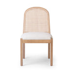 Featuring Esmee Antwerp Natural Dining Chair by Four Hands at Amethyst Home. Natural nettlewood shapes the arched, angled back of this simply shaped, armless dining chair. Natural crosshatch cane adds a light texture to complement the creamy, neutral upholstered seat. Performance fabrics are specially created to withstand spills, stains, high traffic an. Amethyst Home provides interior design, new home construction design consulting, vintage area rugs, and lighting in the Newport Beach metro area.