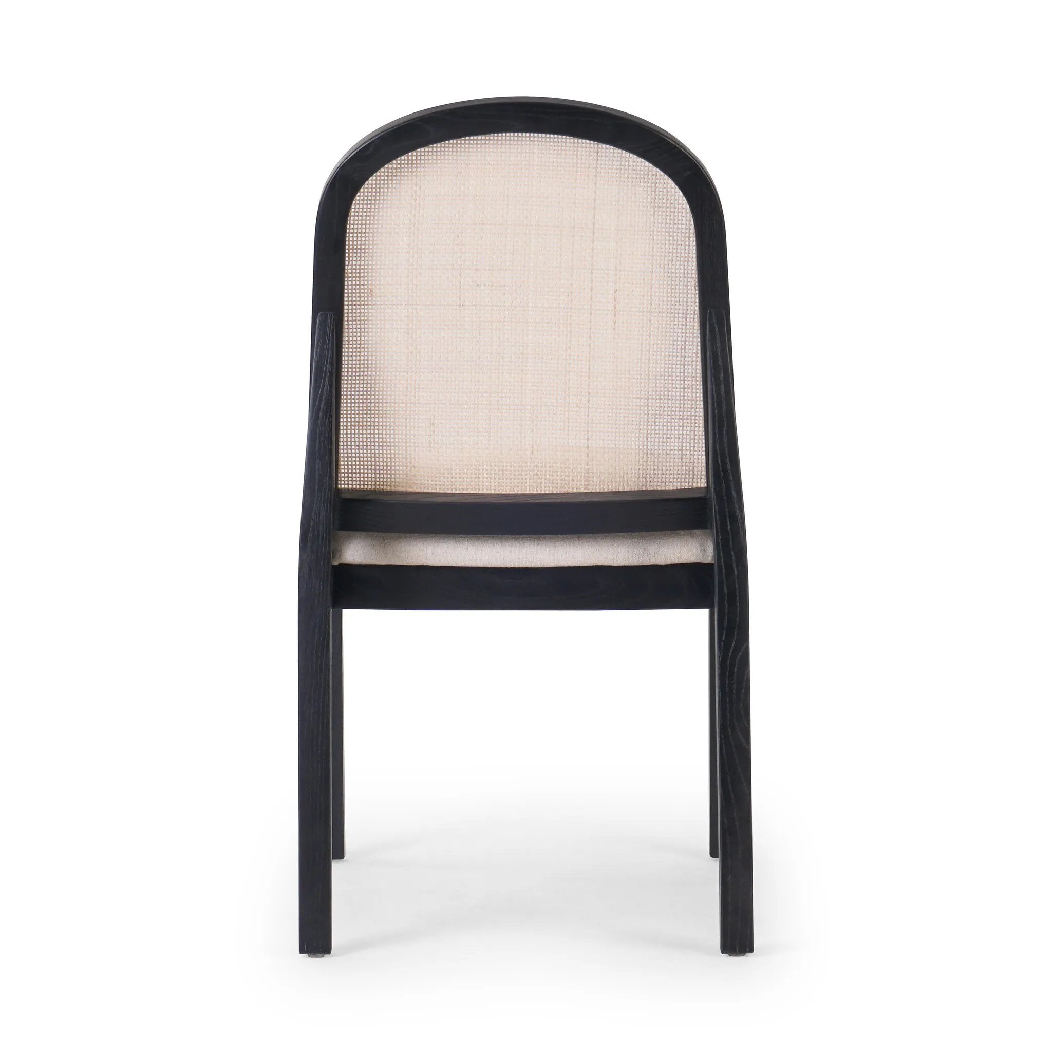 Ebony nettlewood shapes the arched, angled back of this simply shaped, armless dining chair. Natural crosshatch cane adds a light texture to complement the creamy, neutral upholstered seat. Performance fabrics are specially created to withstand spills, stains, high traffic and wear, ensuring long-term comfort and unmatched durability Amethyst Home provides interior design, new home construction design consulting, vintage area rugs, and lighting in the Salt Lake City metro area.
