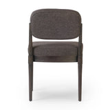 Modern materials place an updated twist on the traditional armless dining chair. Linen/cotton blend cushioning upholstered in high-performance fabric, perfect for everyday dining. Simply framed by burnt oak. Amethyst Home provides interior design, new home construction design consulting, vintage area rugs, and lighting in the Dallas metro area.