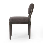 Modern materials place an updated twist on the traditional armless dining chair. Linen/cotton blend cushioning upholstered in high-performance fabric, perfect for everyday dining. Simply framed by burnt oak. Amethyst Home provides interior design, new home construction design consulting, vintage area rugs, and lighting in the Newport Beach metro area.