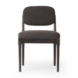 Modern materials place an updated twist on the traditional armless dining chair. Linen/cotton blend cushioning upholstered in high-performance fabric, perfect for everyday dining. Simply framed by burnt oak. Amethyst Home provides interior design, new home construction design consulting, vintage area rugs, and lighting in the Tampa metro area.