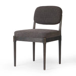 Modern materials place an updated twist on the traditional armless dining chair. Linen/cotton blend cushioning upholstered in high-performance fabric, perfect for everyday dining. Simply framed by burnt oak. Amethyst Home provides interior design, new home construction design consulting, vintage area rugs, and lighting in the Winter Garden metro area.